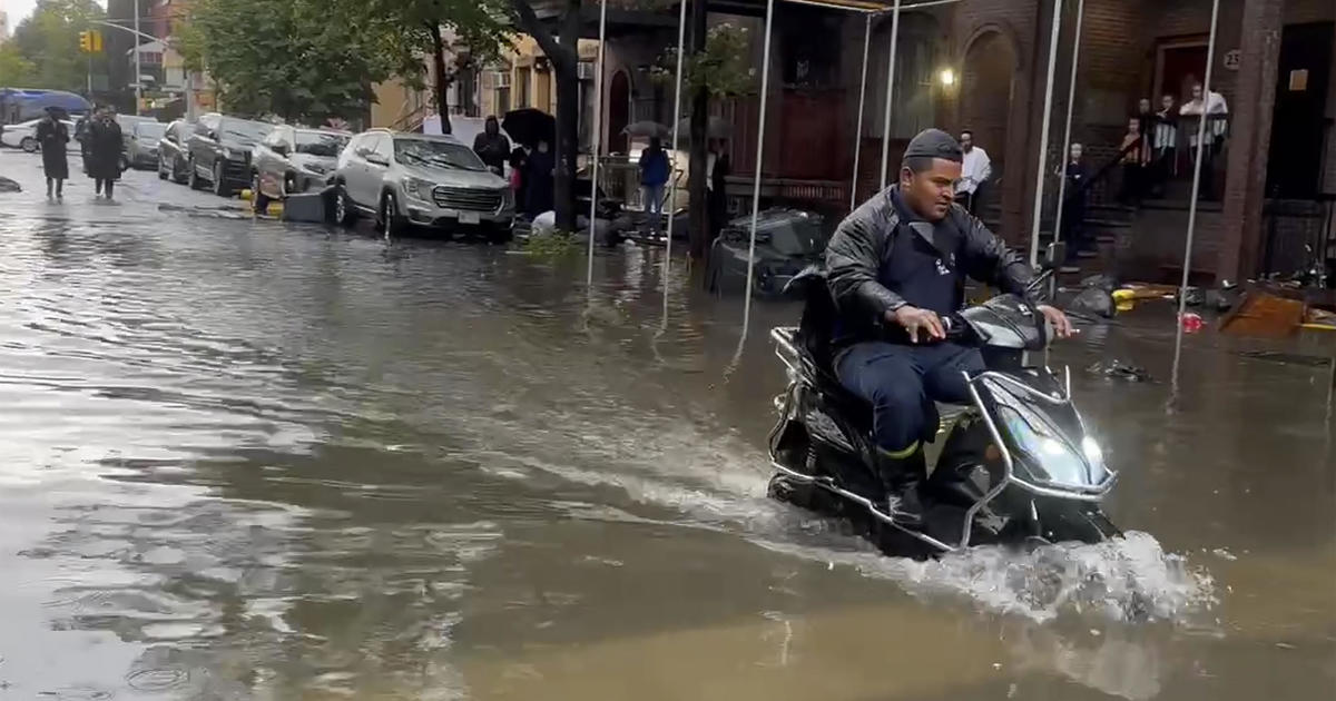 New York City works to dry out after severe flooding: "Outside was like a lake"