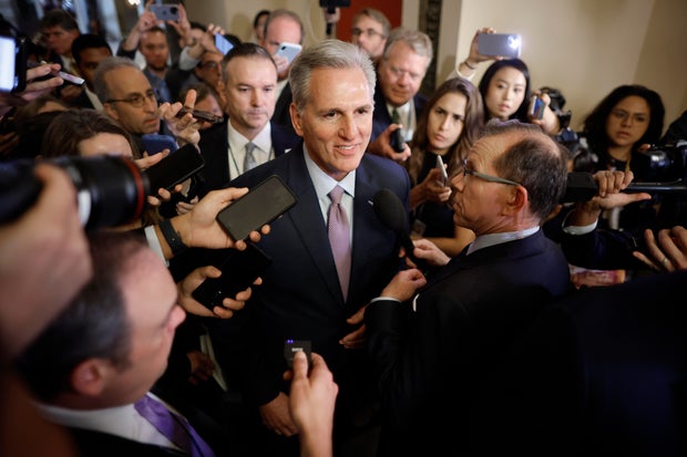 Speaker of the House Kevin McCarthy surrounded by journalists at the Capitol
