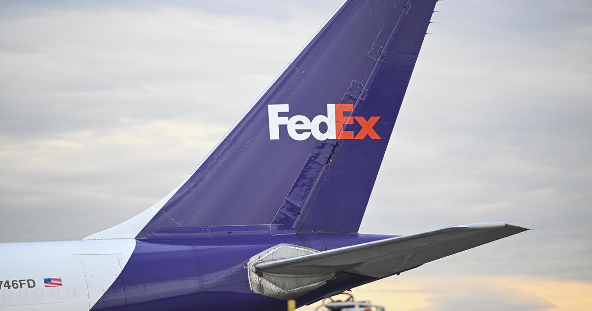 FedEx 757 with landing gear failure crash lands, skids off runway in Chattanooga