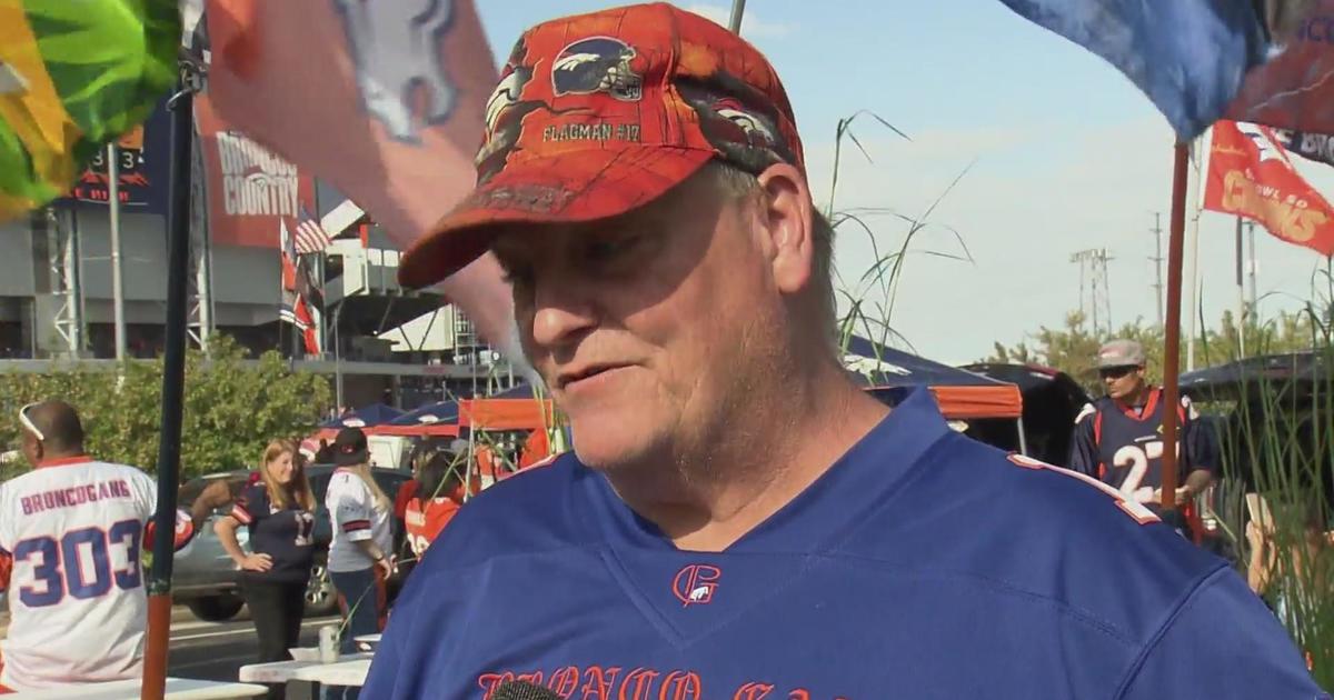 A Denver Broncos Christmas tree is set up as fans tailgate prior