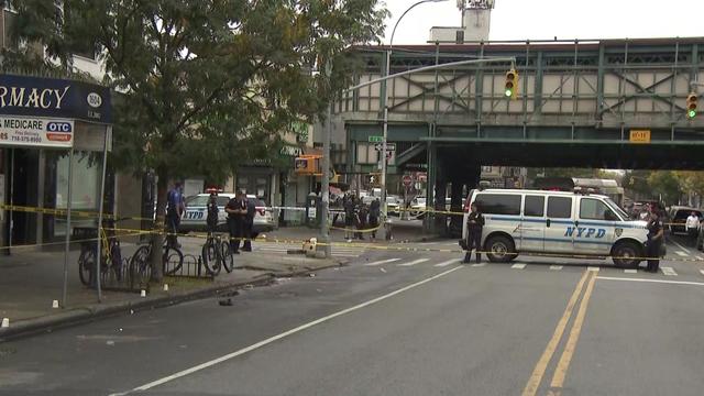 Crime scene tape blocks off a street in Brooklyn. 