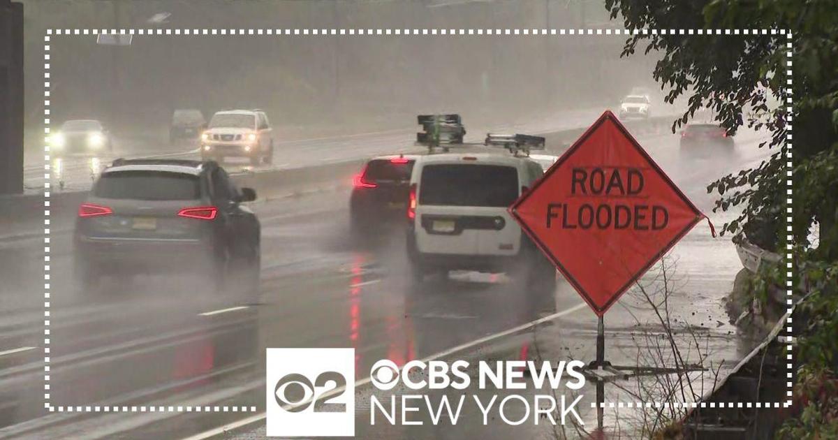 Drivers speed through flooded Route 3 in Clifton, New Jersey - CBS New York