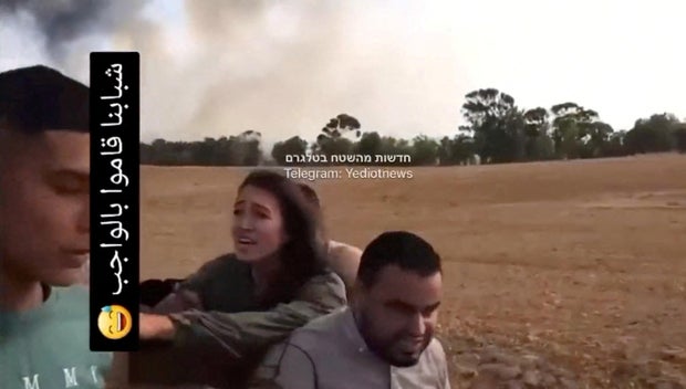 A screengrab from a social media video published on October 7, 2023 shows Noa Argamani as she is taken hostage by Palestinian militants