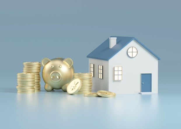 Casas y monedas renderizadas en 3D.