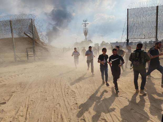Palestinians take down the Israel-Gaza border 