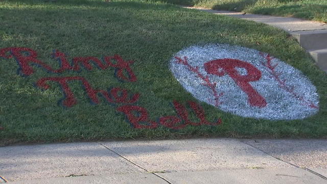 Philadelphia artist painting Eagles logos on fans' lawns - CBS Philadelphia