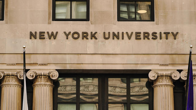 A view of New York University sign on the campus building 