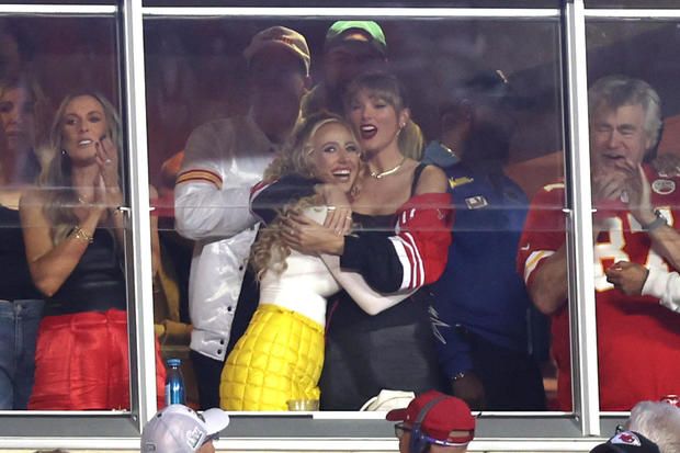 Lyndsay Bell, Brittany Mahomes and Taylor Swift celebrate during the first half of the game between the Kansas City Chiefs and the Denver Broncos at GEHA Field at Arrowhead Stadium on October 12, 2023, in Kansas City, Missouri. 
