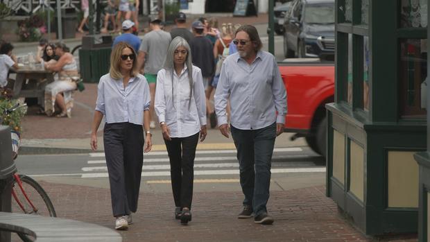 Sharyn Alfonsi walks with Jackie and Larkin Stallings 