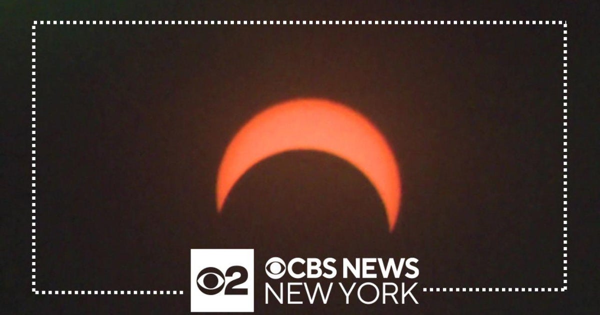Partial solar eclipse darkens sky across several states - CBS New York