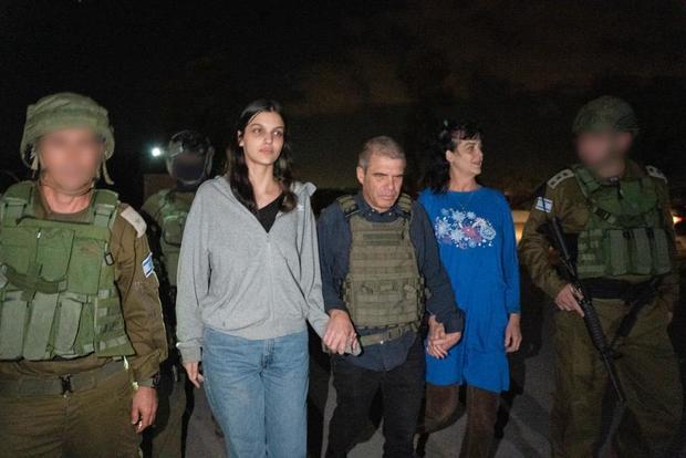 Natalie Raanan, grey shirt, and her mother, Judith, are seen with Israeli security forces after they were released by Hamas on Oct. 20, 2023. 