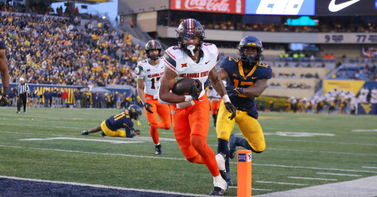 Gordon romps for 282 yards, 4 TDs, Oklahoma State outlasts West