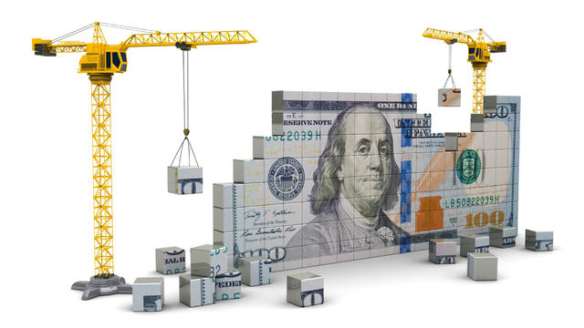 cranes building money 