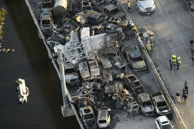 In this aerial photo, responders are seen near wreckage of a multi-vehicle pileup on I-55 in Manchac, La., on Oct. 23, 2023. 