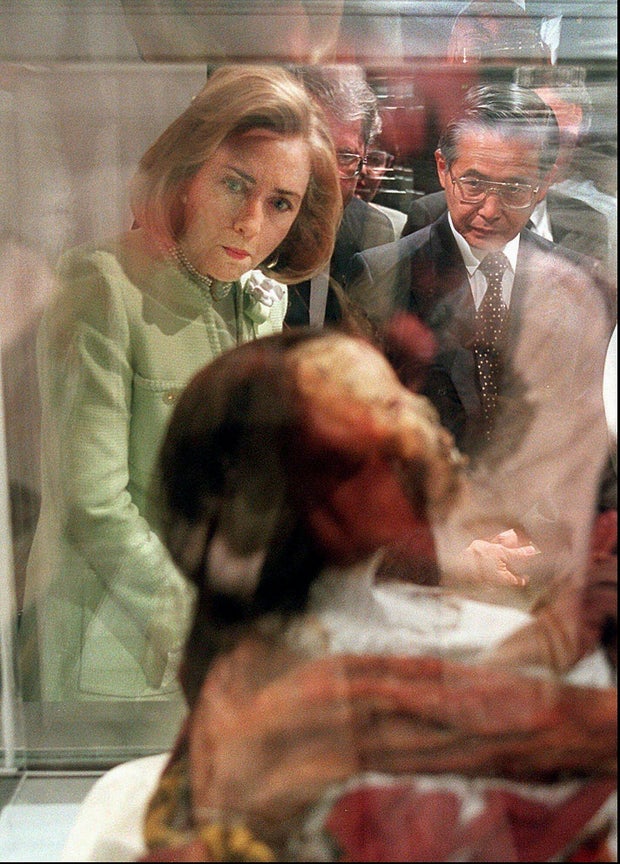 First lady Hillary Rodham Clinton and Peru Prime Minister Alberto Fujimori look over a 500-year-old mummy on display on May 21, 1996