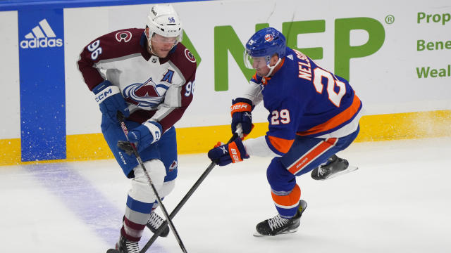 Colorado Avalanche Right Wing Mikko Rantanen (96) passes the puck against New York Islanders Center Brock Nelson (29) during the first period of the National Hockey League game between the Colorado Avalanche and the New York Islanders on October 24, 2023, 