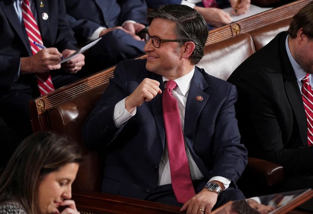 Speaker-elect Mike Johnson pumps his fist as the end of voting nears for speaker of the House on Oct. 25, 2023.