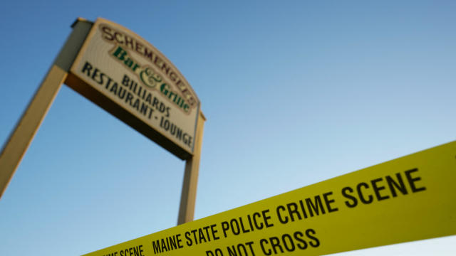 Police tape is seen outside Schemengees Bar & Grille Restaurant, one of the locations of the deadly mass shooting in Lewiston, Maine, October 28, 2023. 