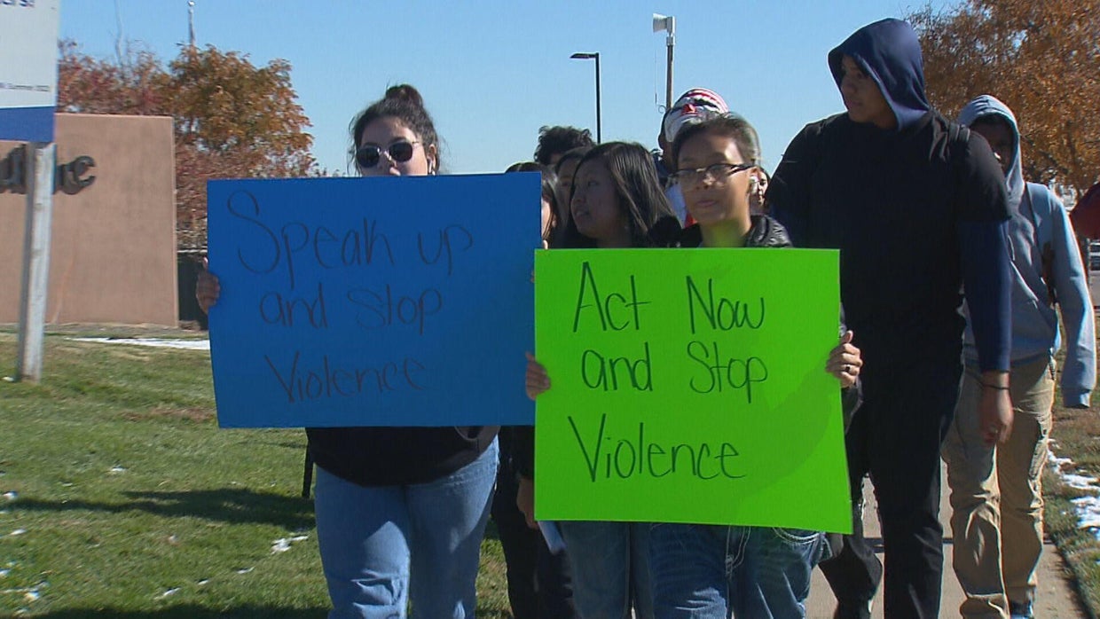 Dozens of Martin Luther King Jr. Early College students walk out of