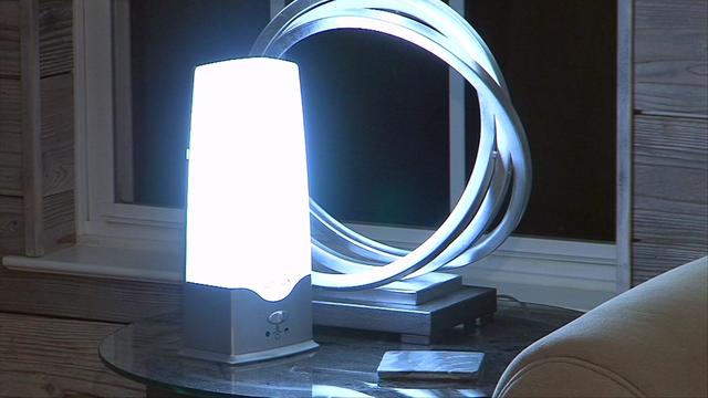 A daytime lamp sitting on a nightside. 
