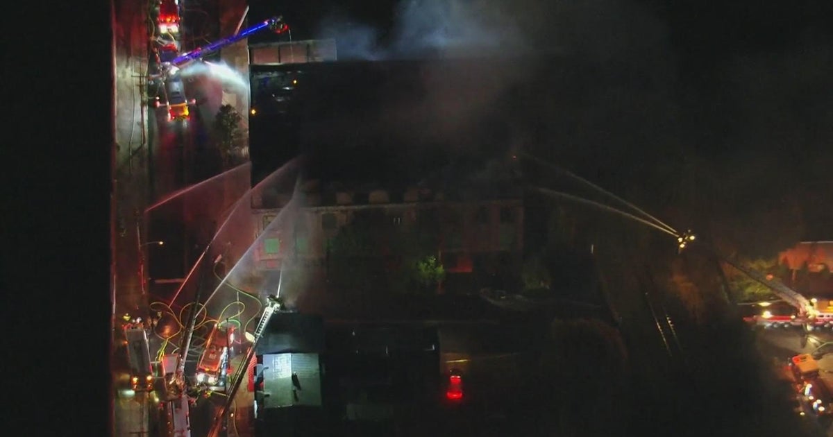 Crews battle 2-alarm fire at abandoned factory in Reading - CBS ...
