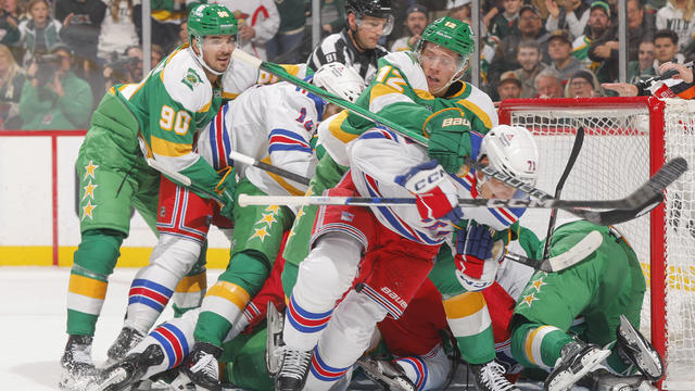 Marcus Johansson #90 and Matt Boldy #12 of the Minnesota Wild get into a scrum with Tyler Pitlick #71 and Connor Mackey #12 of the New York Rangers during the game at the Xcel Energy Center on November 4, 2023 in Saint Paul, Minnesota. 