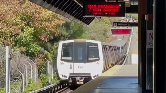 BART train arriving at a station 