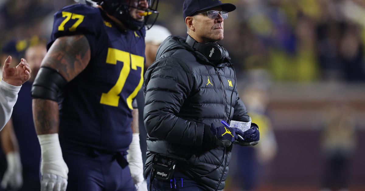 Large 10 suspends Michigan football coach Jim Harbaugh amid sign-thieving investigation