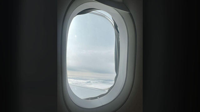 A windowpane is seen missing midflight from a window on an Airbus A321 plane heading from the U.K. to Orlando, Florida, Oct. 4, 2023. 