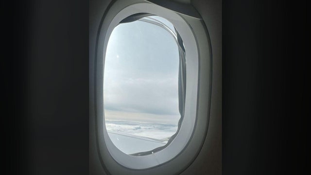 A windowpane is seen missing midflight from a window on an Airbus A321 plane heading from the U.K. to Orlando, Florida, Oct. 4, 2023.
