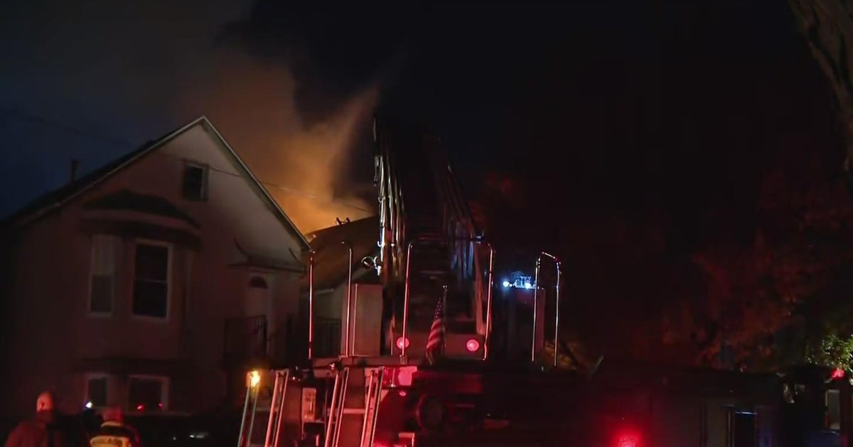 Fire inside Chicago residence leaves woman dead, man hurt - CBS Chicago
