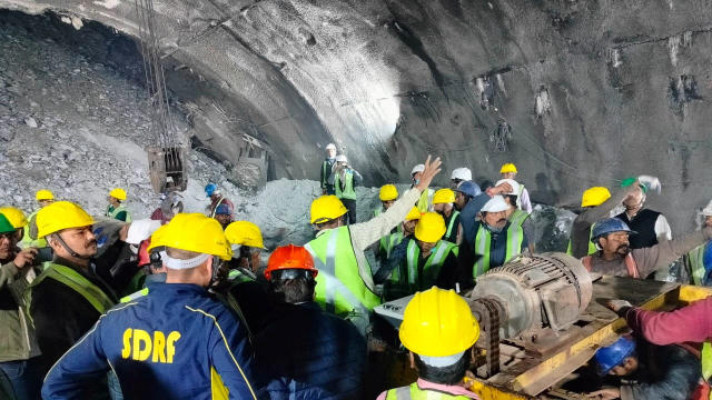 Members of rescue teams prepare to conduct a rescue operation after a portion of an under-construction tunnel collapsed in Uttarkashi 