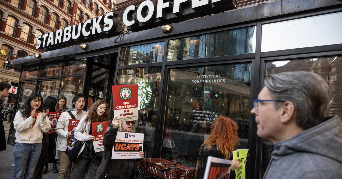 Starbucks workers stage strike on coffee chain’s “Red Cup” day