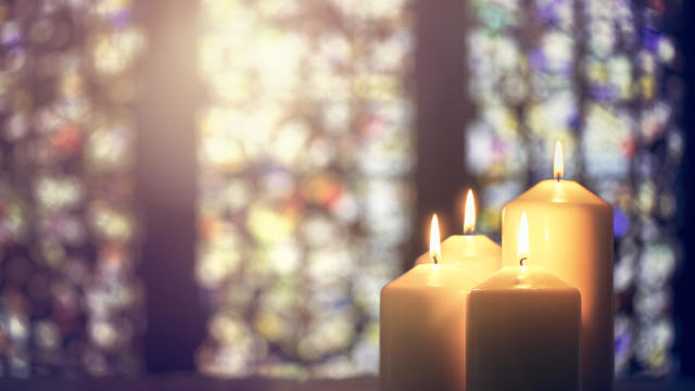 Candles in a church background 