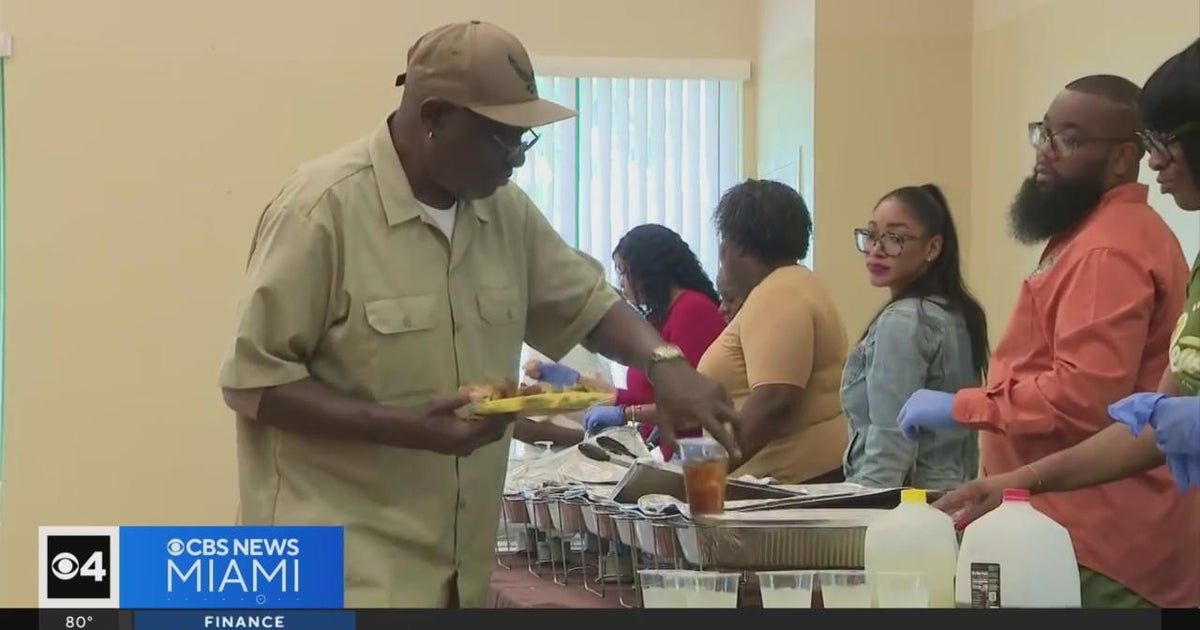 Displaced Glorieta Gardens residents treated to holiday feast, awaiting
