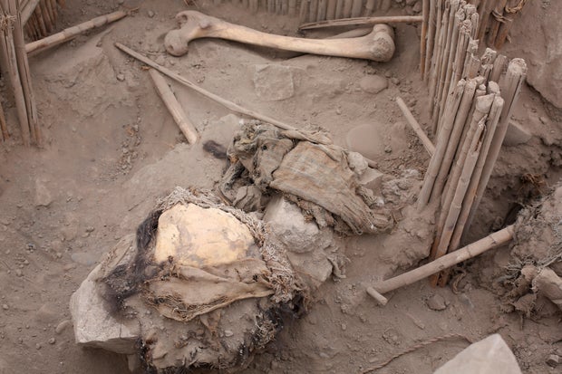 The remains of a mummy that, according to archaeologists, belongs to the pre-Inca Ychsma culture that inhabited the central coast of Peru from approximately 900 to 1450 A.D. is pictured at the Huaca La Florida archaeological site in Lima, Peru, Nov. 21, 2023