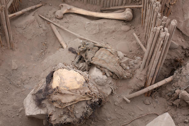 The remains of a mummy that, according to archaeologists, belongs to the pre-Inca Ychsma culture that inhabited the central coast of Peru from approximately 900 to 1450 A.D. is pictured at the Huaca La Florida archaeological site in Lima, Peru, Nov. 21, 2023. 