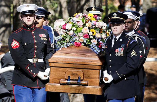 A military honor guard carries the casket of former first lady Rosalynn Carter from the Jimmy Carter Presidential Library and Museum en route to a memorial service at Emory University's Glenn Memorial Church, in Atlanta, Georgia, Nov. 28, 2023. 