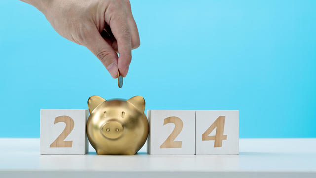 2024 new year and piggy bank on the table 