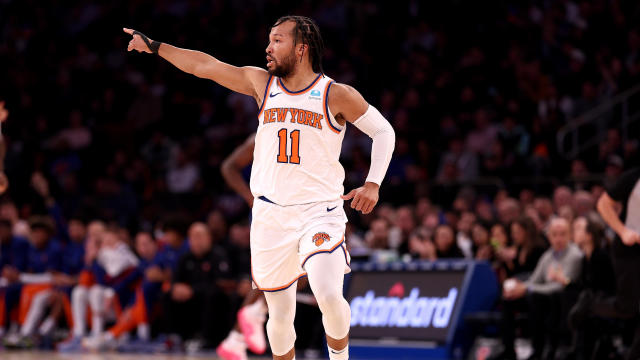 Jalen Brunson #11 of the New York Knicks celebrates his three point shot in the third quarter against the Detroit Pistons at Madison Square Garden on November 30, 2023 in New York City. 