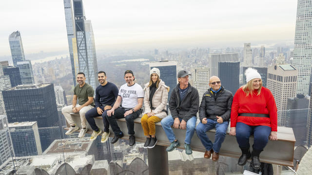 Visitors enjoy Rockefeller Center's new interactive experience "The Beam" at Top of the Rock Observation Deck on the 69th floor, Friday, Dec. 1, 2023 in New York. 