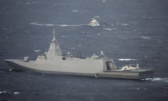 Japan Maritime Self-Defense Force's vessel conducts a search and rescue operation at the site where a U.S. military aircraft V-22 Osprey crashed into the sea off Yakushima Island