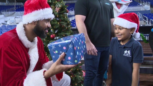 12-11-marlins-toy-distribution.jpg