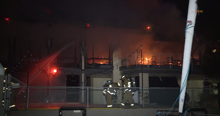 2 firefighters injured battling massive fire at yacht club in Marina ...