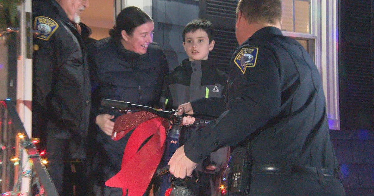 Boston police union replaces West Roxbury boy's stolen bike - CBS Boston