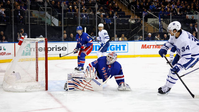 Auston Matthews #34 of the Toronto Maple Leafs scores at 3:52 of the first period against Igor Shesterkin #31 of the New York Rangers at Madison Square Garden on December 12, 2023 in New York City. 