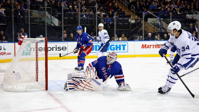 Auston Matthews #34 of the Toronto Maple Leafs scores at 3:52 of the first period against Igor Shesterkin #31 of the New York Rangers at Madison Square Garden on December 12, 2023 in New York City.