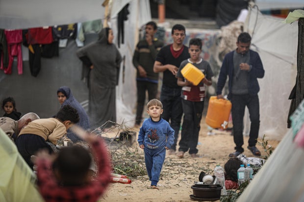 Displaced Palestinian families live in tents in the Al-Mawasi area of Rafah, in the south of the Gaza Strip near the border with Egypt, Dec. 7, 2023