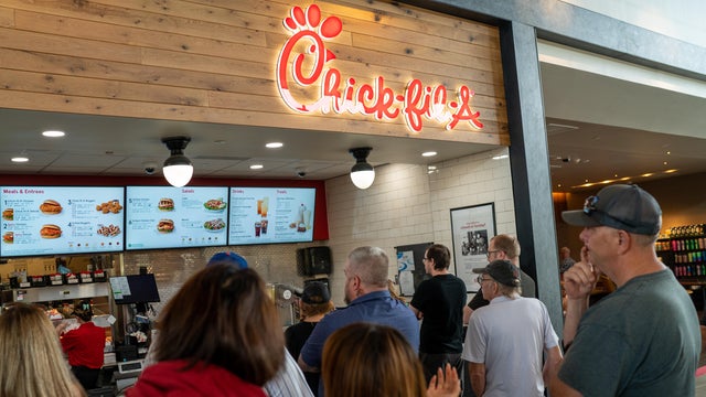Customers stand in line to order food at a Chick-fil-A restaurant June 15, 2023 along I-87 interstate in Platekill, New York.