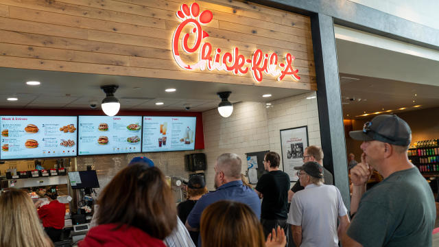 Customers stand in line to order food at a Chick-fil-A restaurant June 15, 2023 along I-87 interstate in Platekill, New York. 
